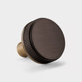 Antique Brass Door Knobs with Linear Top In Bronze