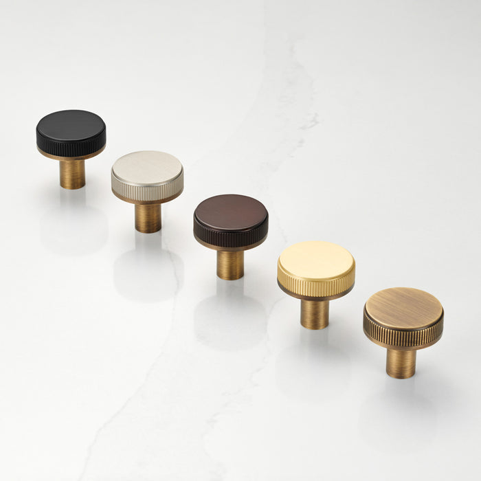 Antique Brass Door Knobs with Linear Top In Gold – installed view