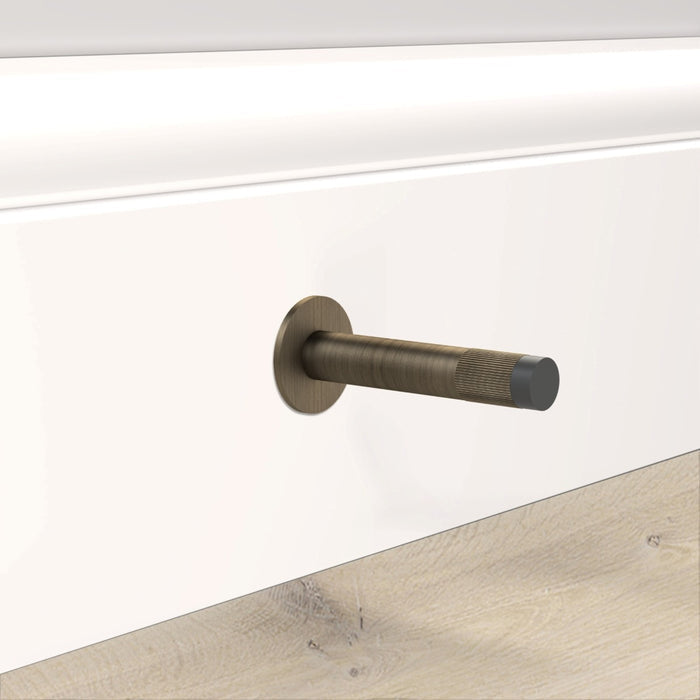 Antique Linear Wall Mounted Door Stop in Antique – installed view