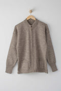 Beige Zipped Guernsey Jacket on a wooden hanger