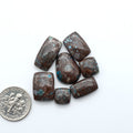 Rare Bisbee Turquoise cabochons with rich blue color and classic brown matrix. Perfect for jewelry makers, collectors, and lovers of fine American turquoise.