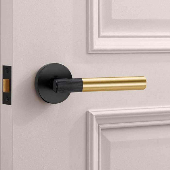 Black Linear Lever Handle with Tip in Gold – installed view