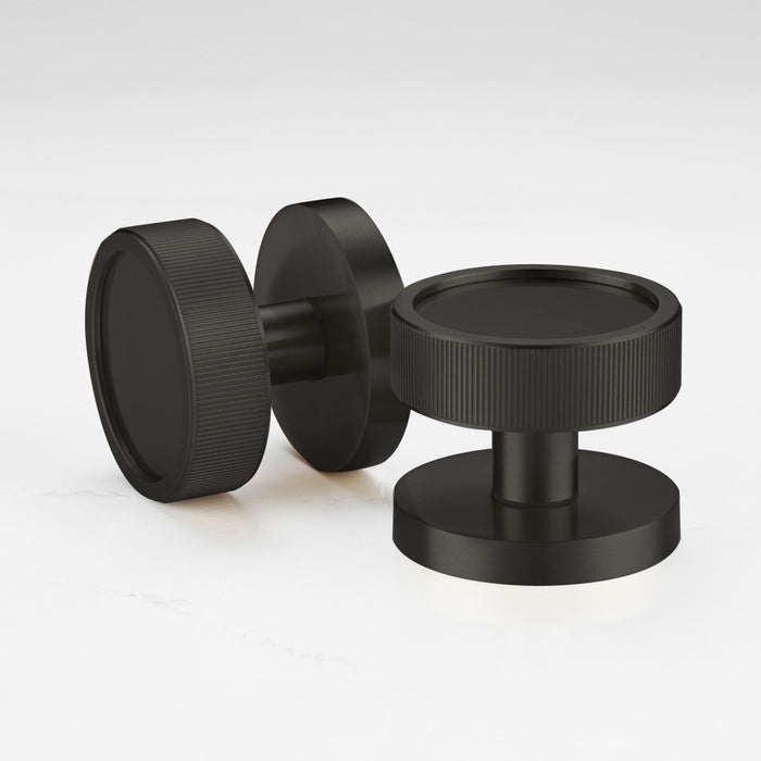 Black Linear Mortice Door Knob Pair – installed view
