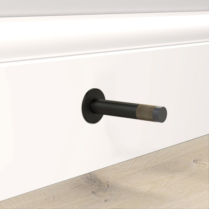 Black Linear Wall Mounted Door Stop in Antique – installed view