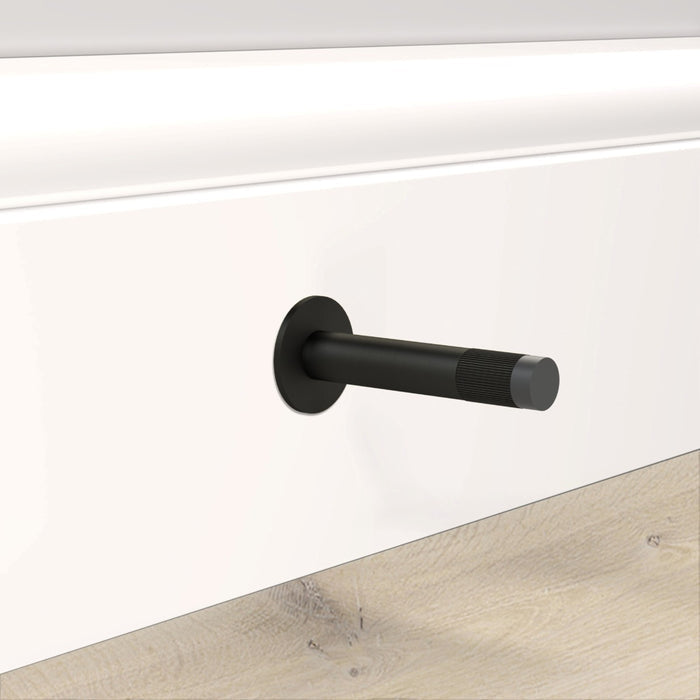 Black Linear Wall Mounted Door Stop in Black – installed view