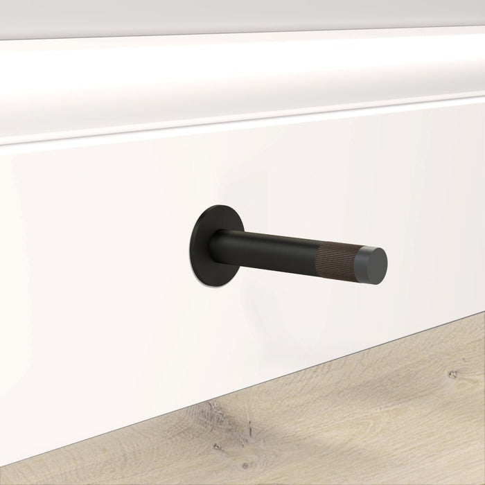 Black Linear Wall Mounted Door Stop in Bronze – installed view