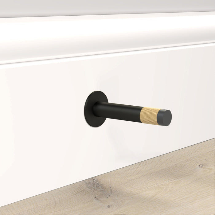Black Linear Wall Mounted Door Stop in Gold – installed view