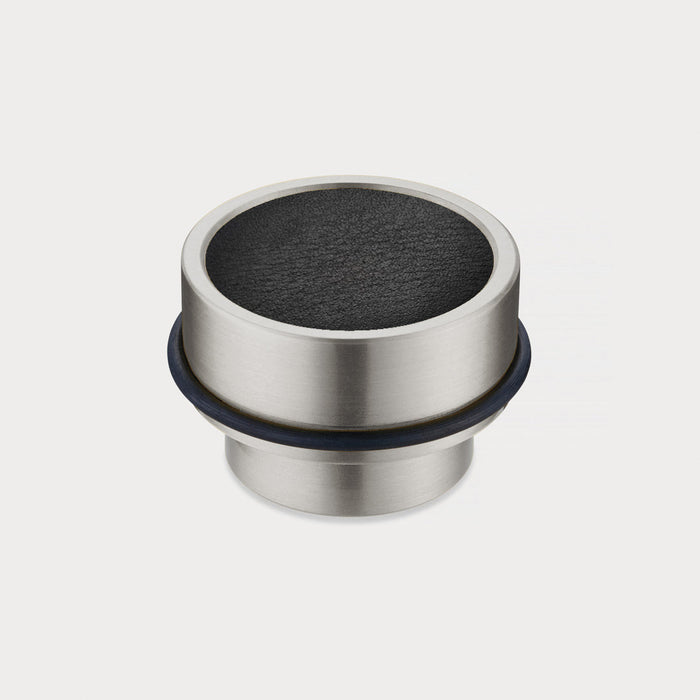 Brass & Black Leather Mounted Door Stops in Silver – installed view
