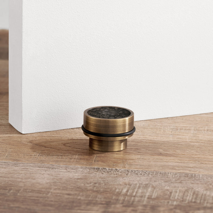 Brass & Black Terrazzo Floor Mounted Door Stops in Antique