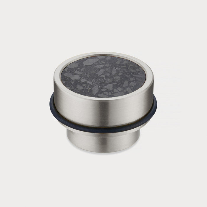 Brass & Black Terrazzo Floor Mounted Door Stops in Silver – installed view