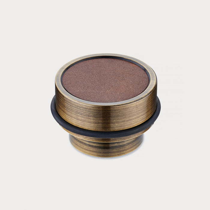 Brass & Brown Leather Mounted Door Stops in Antique – installed view