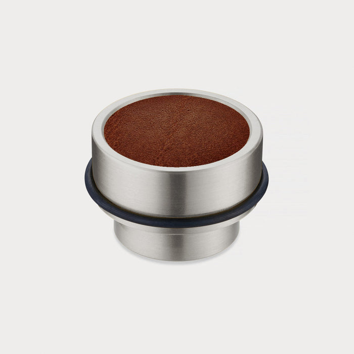 Brass & Brown Leather Mounted Door Stops in Silver – installed view