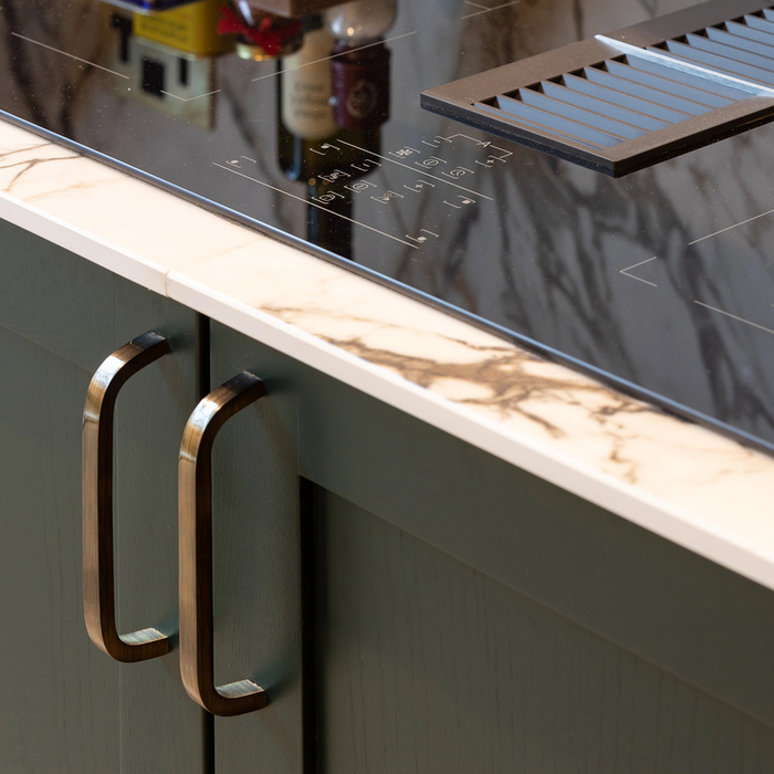 Brass Curved Cabinet Handles in Antique – product view 2