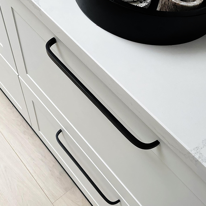 Brass Curved Cabinet Handles in Black – product view 3