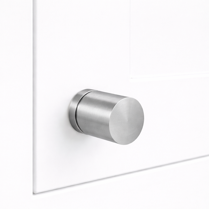 Brass Cylinder Pulls in Silver – installed view