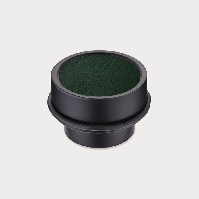 Brass & Green Leather Mounted Door Stops in Black – installed view