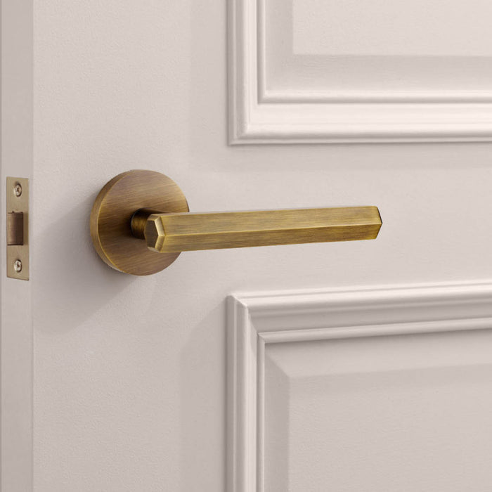 Brass Hexagonal Lever Door Handle in Antique – installed view