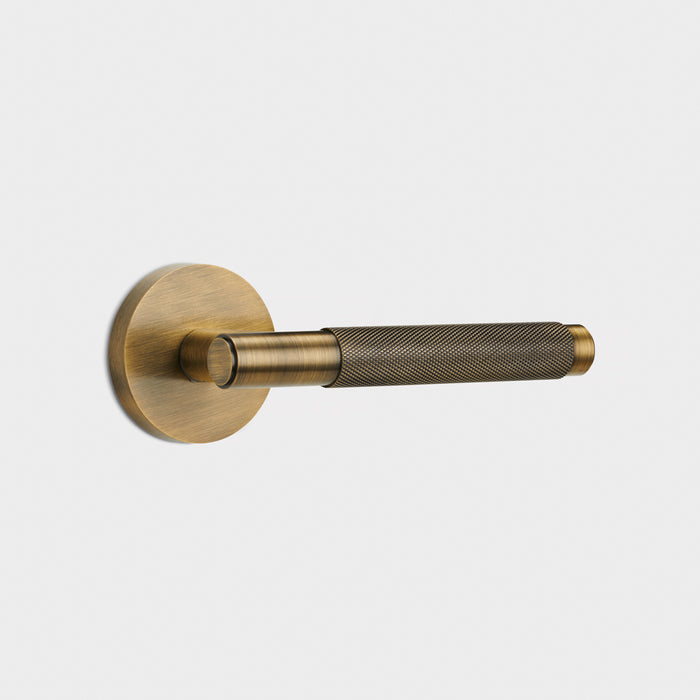 Brass Knurled Lever Door Handle in Antique