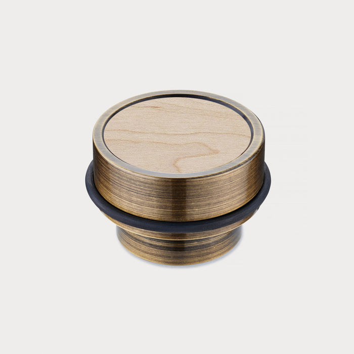 Brass & Maple Wood Floor Mounted Door Stops in Antique – installed view
