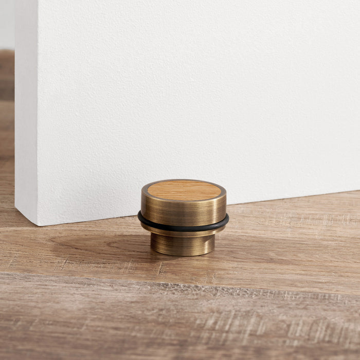 Brass & Oak Wood Floor Mounted Door Stops in Antique