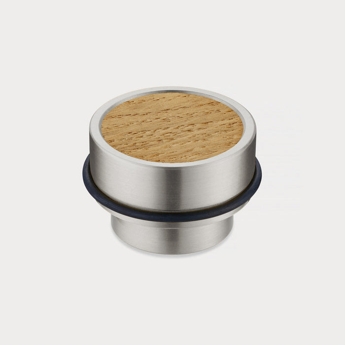 Brass & Oak Wood Floor Mounted Door Stops in Silver – installed view