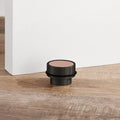 Brass & Pink Leather Mounted Door Stops in Black