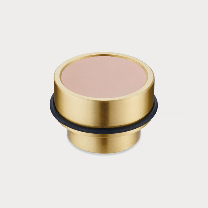 Brass & Pink Leather Mounted Door Stops in Gold – installed view