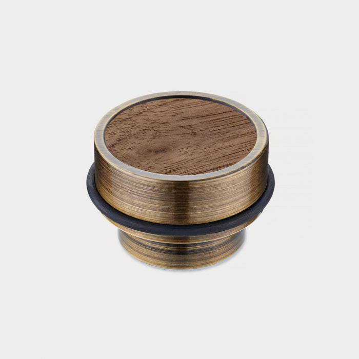 Brass & Walnut Wood Floor Mounted Door Stops in Antique – installed view