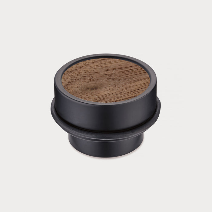 Brass & Walnut Wood Floor Mounted Door Stops in Black – installed view
