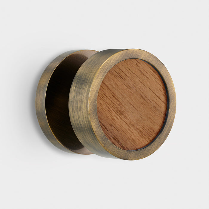 Brass and walnut mortice door knobs