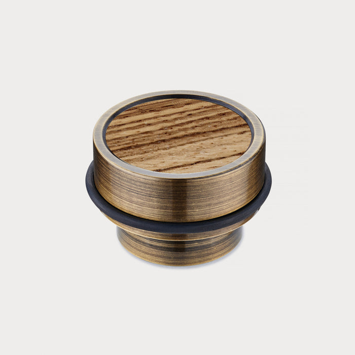 Brass & Zebrano Wood Floor Mounted Door Stops in Antique – installed view