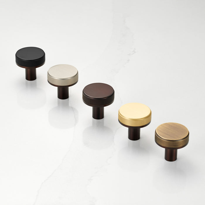 Bronze Brass Linear Door Knobs with Tip In Gold – installed view