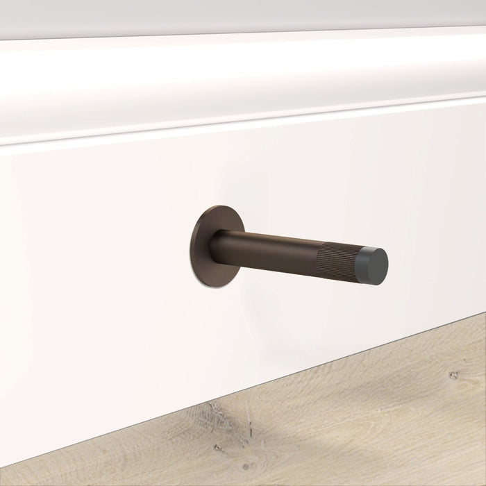 Bronze Linear Wall Mounted Door Stop in Bronze – installed view