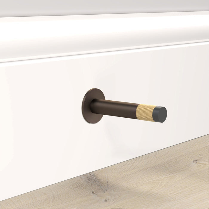 Bronze Linear Wall Mounted Door Stop in Gold – installed view