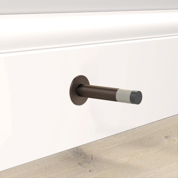 Bronze Linear Wall Mounted Door Stop in Silver – installed view