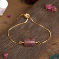 Elegant Golden Chain Bracelet with Single Strawberry Quartz Bead