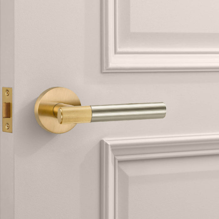 Gold Linear Lever Handle with Tip in Silver – installed view