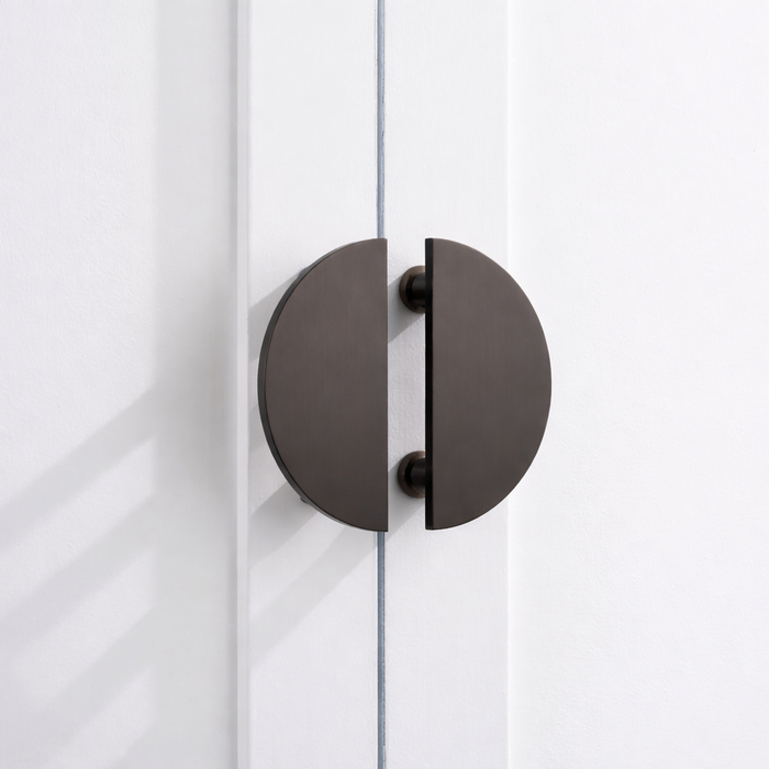 Large Solid Brass Half Moon Handles in Bronze – installed view