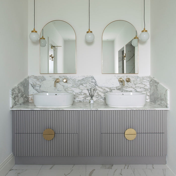 Large Solid Brass Striped Half Moon Handles in Gold – installed view