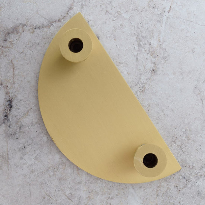 Large Solid Brass Striped Half Moon Handles in Gold – installed view