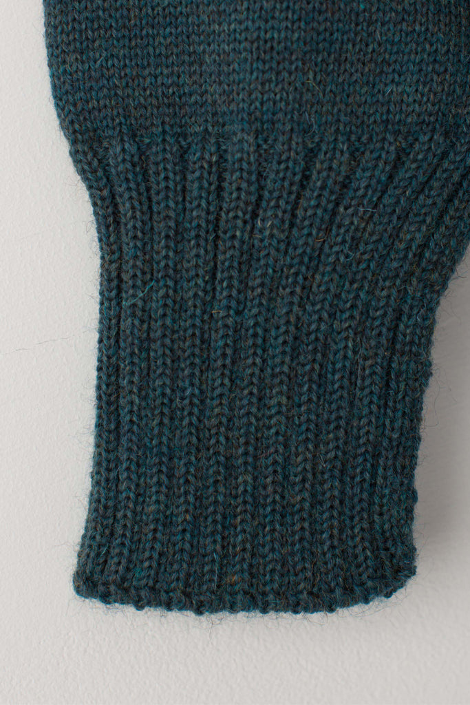 Open cuff detail on a Mallard Green Traditional Guernsey