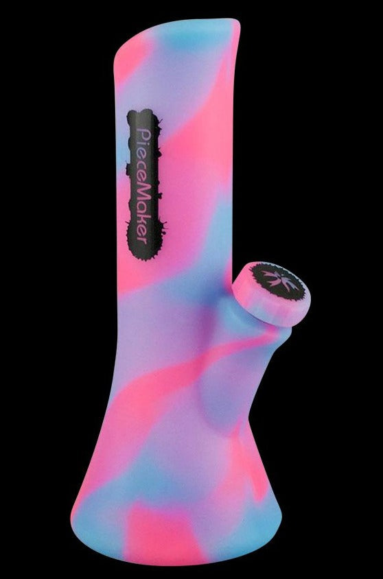 Front view of the PieceMaker Water Pipe - Kali, showcasing its colorful, curved glass design against a dark background.