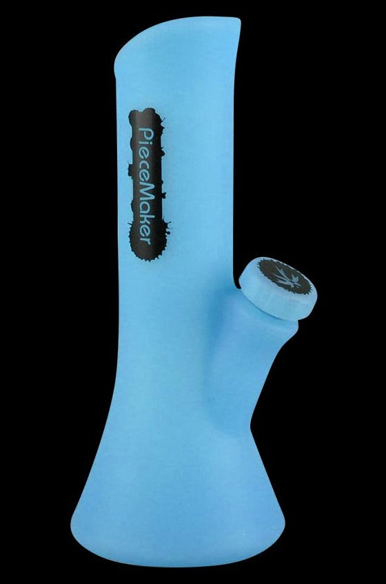 Front view of the PieceMaker Water Pipe - Kali, showcasing its smooth, curved form against a dark background.