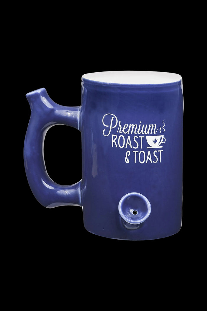 Blue ceramic mug with a built-in glass pipe bowl and text reading “Premium Roast & Toast.”
