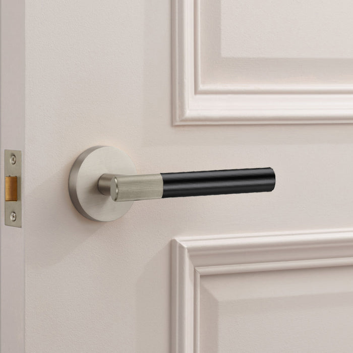Silver Linear Lever Handle with Tip in Black – installed view