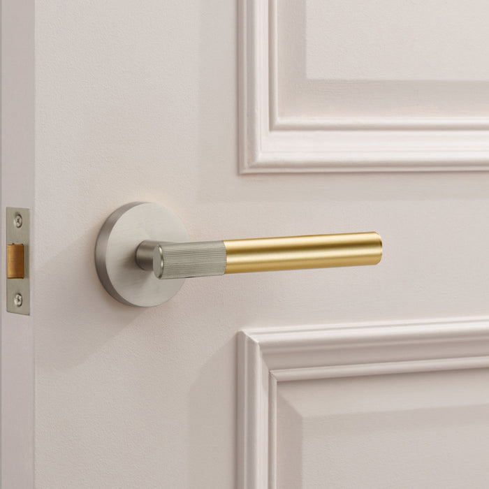 Silver Linear Lever Handle with Tip in Gold – installed view