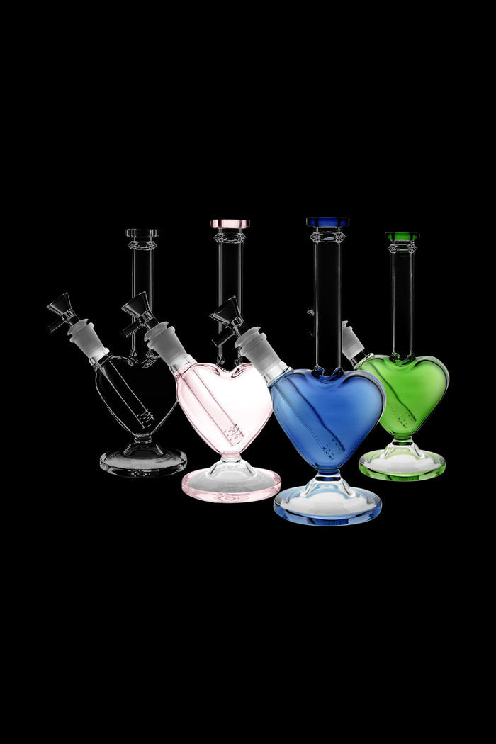 A studio shot of the Heart Shaped Glass Bong, displaying two blue and clear glass bongs from a low angle.