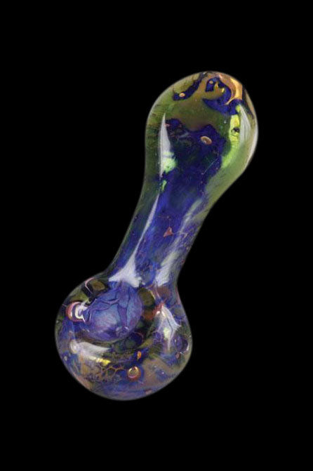 Hand-blown glass pipe with swirling blue, green, and gold patterns.