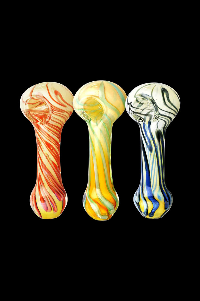 Front-facing trio of worked swirl spoon pipes showing red, yellow-green, and blue swirl patterns on a black background, Worked Swirl Spoon Pipe - Gilbert